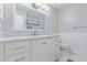 Modern bathroom with white cabinets, marble counters, and sleek fixtures at 6459 E Sugarloaf St, Mesa, AZ 85215
