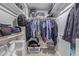 Well-organized walk-in closet with ample storage and shelving for clothes and accessories at 6459 E Sugarloaf St, Mesa, AZ 85215