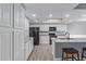 Bright, open kitchen featuring granite countertops and stainless appliances at 6459 E Sugarloaf St, Mesa, AZ 85215