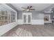 Bright living room with plank flooring, stylish trim, and french doors at 6459 E Sugarloaf St, Mesa, AZ 85215