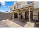 Covered patio with a brick wall in the background at 6743 S Jentilly Ln, Tempe, AZ 85283