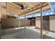 Covered patio includes a ceiling fan and decorative gravel at 6743 S Jentilly Ln, Tempe, AZ 85283