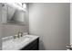 Bathroom features a sink with a marble countertop at 6743 S Jentilly Ln, Tempe, AZ 85283
