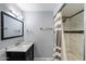 Bathroom features a marble countertop and a shower at 6743 S Jentilly Ln, Tempe, AZ 85283