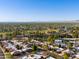 A high aerial view of this home in a well maintained community; nearby lake and golf at 7710 N Via De Fonda St, Scottsdale, AZ 85258