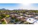 A high aerial view of this home in a well maintained community and beautiful landscaping at 7710 N Via De Fonda St, Scottsdale, AZ 85258
