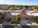 Aerial view showcasing a well-maintained community with lush landscaping, private driveways, and a well-designed neighborhood layout at 7710 N Via De Fonda St, Scottsdale, AZ 85258