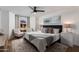 Bedroom with a large arched window and a cozy seating area at 7710 N Via De Fonda St, Scottsdale, AZ 85258