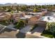 Beautiful exterior featuring a tile roof, desert landscaping, and a two-car garage at 7710 N Via De Fonda St, Scottsdale, AZ 85258