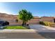 Attractive single-story home with manicured lawn and desert landscaping at 7710 N Via De Fonda St, Scottsdale, AZ 85258