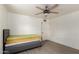Minimalist bedroom with modern bed frame and flooring at 813 N Gilbert Ave, Casa Grande, AZ 85122