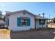Sweet home with blue shutters at 813 N Gilbert Ave, Casa Grande, AZ 85122