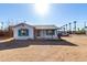 Charming single-story home with desert landscaping and inviting covered entry at 813 N Gilbert Ave, Casa Grande, AZ 85122