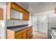 Bright kitchen featuring wood cabinets and spacious countertops at 813 N Gilbert Ave, Casa Grande, AZ 85122