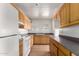 Well-lit kitchen featuring ample storage and counter space at 813 N Gilbert Ave, Casa Grande, AZ 85122
