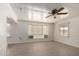 Light-filled living room with bay window and built-in shelving at 813 N Gilbert Ave, Casa Grande, AZ 85122
