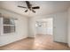 Bright, open living room with tile floors and natural light at 813 N Gilbert Ave, Casa Grande, AZ 85122