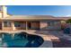 Inviting backyard showcasing a sparkling pool, ideal for relaxation and entertaining friends at 8606 W Caribbean Ln, Peoria, AZ 85381