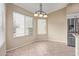 Bright breakfast nook featuring natural light and space for casual dining at 8606 W Caribbean Ln, Peoria, AZ 85381