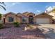 Charming single-story home with a well-maintained front yard and inviting entrance at 8606 W Caribbean Ln, Peoria, AZ 85381