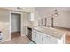 Lovely kitchen island with bar seating and stainless steel appliances at 8606 W Caribbean Ln, Peoria, AZ 85381