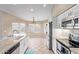 Bright and inviting kitchen with modern appliances and countertops, perfect for cooking at 8606 W Caribbean Ln, Peoria, AZ 85381