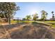 Community playground featuring swing sets and grassy areas, perfect for outdoor activities at 8606 W Caribbean Ln, Peoria, AZ 85381