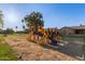 Community playground with colorful equipment, offers a safe and fun space for children to play at 8606 W Caribbean Ln, Peoria, AZ 85381