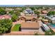 Aerial view of home with a large detached garage, RV parking, desert landscaping, and a pool in backyard at 8913 W Country Club Trl, Peoria, AZ 85383