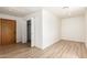 Spacious bedroom with a large closet and wood-look flooring at 8913 W Country Club Trl, Peoria, AZ 85383