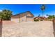 Exterior view of detached garage on a sunny day at 8913 W Country Club Trl, Peoria, AZ 85383