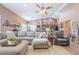 Spacious living room with comfortable seating and stylish decor at 9576 W Blue Sky Dr, Peoria, AZ 85383