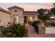 Charming home exterior with a brick walkway and well-manicured landscaping at 9721 E Juanita Ave, Mesa, AZ 85209