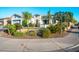 Charming single-story home featuring stucco siding, well-manicured landscaping, and a welcoming entrance at 9721 E Juanita Ave, Mesa, AZ 85209