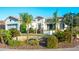 Charming single-story home with desert landscaping, stone accents, and a welcoming front entrance at 9721 E Juanita Ave, Mesa, AZ 85209