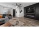 Stylish living room featuring a modern fireplace, wood floors and contemporary decor at 9721 E Juanita Ave, Mesa, AZ 85209