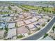 Scenic aerial shot showcasing a well-planned community, desert landscaping, and convenient access to a baseball field at 9856 E Palladium Dr, Mesa, AZ 85212