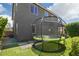 Spacious backyard featuring a trampoline and lush artificial turf for outdoor fun at 9856 E Palladium Dr, Mesa, AZ 85212