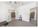 Versatile flex space with a view of another room through decorative glass doors at 9856 E Palladium Dr, Mesa, AZ 85212