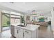 Open-concept kitchen island with stainless steel dishwasher and a view of the backyard at 9856 E Palladium Dr, Mesa, AZ 85212