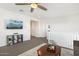 Spacious living room showcasing modern lighting, neutral walls, and staircase at 9856 E Palladium Dr, Mesa, AZ 85212