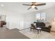 Upstairs loft features a neutral color palette, comfortable seating, and a decorative area rug at 9856 E Palladium Dr, Mesa, AZ 85212