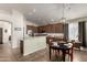 Beautiful kitchen features a breakfast bar, stainless steel appliances, and wood cabinets at 1022 N Kirby St, Gilbert, AZ 85234