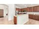 Well-appointed kitchen featuring stainless steel appliances and a convenient breakfast bar at 1022 N Kirby St, Gilbert, AZ 85234