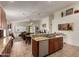 Open-concept kitchen with granite countertops overlooking the dining and living areas at 1022 N Kirby St, Gilbert, AZ 85234