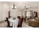 Open-concept living and dining area with tile entryway and comfortable seating arrangement at 1022 N Kirby St, Gilbert, AZ 85234