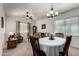Spacious open living and dining area filled with natural light from large windows at 1022 N Kirby St, Gilbert, AZ 85234