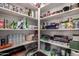 Well-stocked pantry with ample shelving offers great storage for food and kitchen essentials at 1022 N Kirby St, Gilbert, AZ 85234
