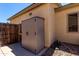The backyard has a large storage shed, perfect for keeping outdoor equipment organized and accessible at 1022 N Kirby St, Gilbert, AZ 85234