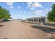View of home, covered patio, and pool area with expansive lot at 10448 E Glencove St, Mesa, AZ 85207